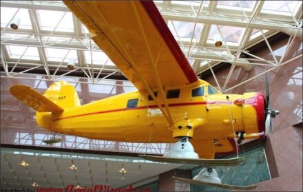 Photo of aircraft hanging within a Calgary office tower lobby.